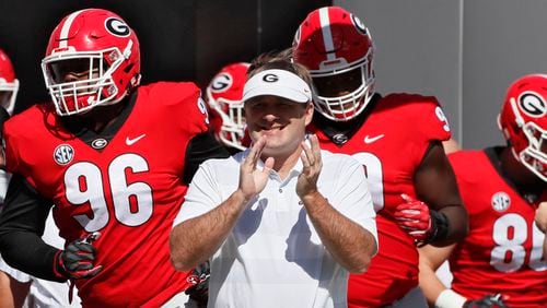Georgia head coah Kirby Smart takes the field with the Bulldogs for pre-game warm ups against the Middle Tennessee Blue Raiders Saturday, Sept 15, 2018, at Sanford Stadium in Athens.