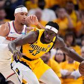 Indiana Pacers forward Pascal Siakam (43) drives around New York Knicks guard Josh Hart, left, during the first half of Game 6 in an NBA basketball second-round playoff series, Friday, May 17, 2024, in Indianapolis. (AP Photo/Michael Conroy)