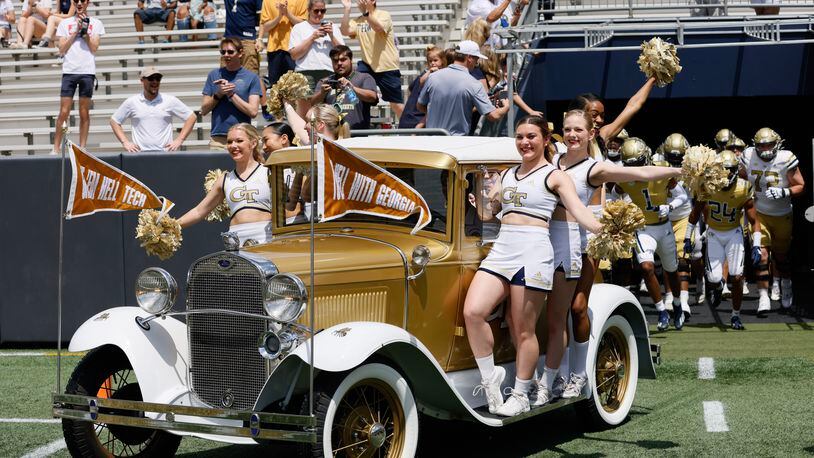 The Ramblin' Wreck leads the teams onto the field for Georgia Tech's spring football game in Atlanta on Saturday, April 15, 2023.  (Bob Andres for the Atlanta Journal Constitution)