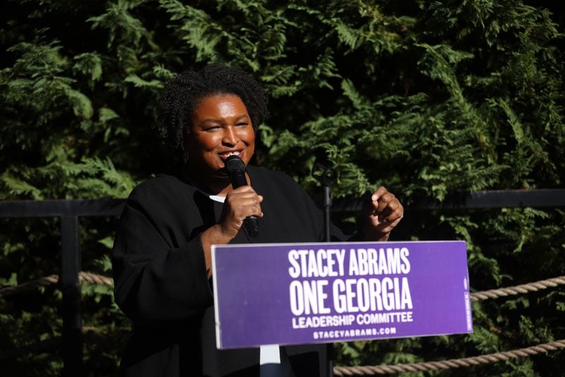 Georgia gubernatorial candidate Stacey Abrams speaks to supporters at a restaurant in historic College Park during the “Let’s Get It Done” bus tour, Thursday, October 20, 2022, in College Park, Ga. (Jason Getz / Jason.Getz@ajc.com)