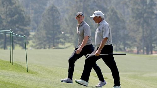 Rory McIlroy, left, and Fred Couples walk up to the fourth tee during their practice round for the Masters at Augusta National Golf Club on Wednesday, April 7, 2021, in Augusta. Curtis Compton/ccompton@ajc.com