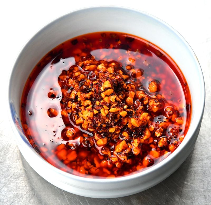 James Park's recipe for Very Nutty Chili Crisp can be made with seeds for a nut-free version.
(Styling by Wendell Brock. Chris Hunt for The Atlanta Journal-Constitution)