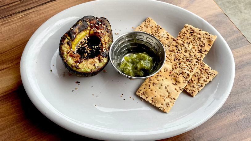 Fire-roasted, creamy avocado is available only at the Toco Hill location of Salaryman. Angela Hansberger for The Atlanta Journal-Constitution