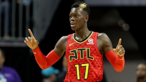 CHARLOTTE, NC - JANUARY 26:  Dennis Schroder #17 of the Atlanta Hawks reacts against the Charlotte Hornets during their game at Spectrum Center on January 26, 2018 in Charlotte, North Carolina.  NOTE TO USER: User expressly acknowledges and agrees that, by downloading and or using this photograph, User is consenting to the terms and conditions of the Getty Images License Agreement.  (Photo by Streeter Lecka/Getty Images)