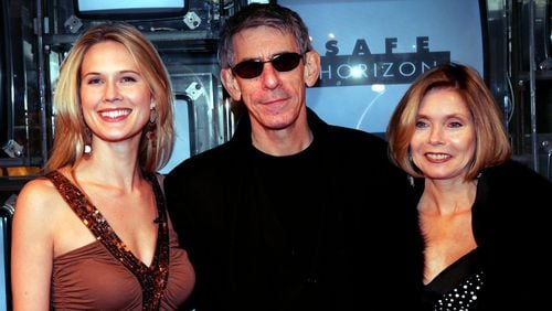Actress Stephanie March, left, with actor Richard Belzer, center, and Harley Mc Bride attend the Safe Horizons presents an evening inside ‘Law and Order: SVU’ at Crobar November 15, 2004 in New York City. March is returning to ‘Law and Order: SVU,’ according to a NBC statement Monday.