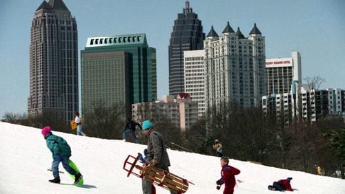 Sledders enjoying the snow in Piedmont Park during the 1993 blizzard in Atlanta in March 1993.