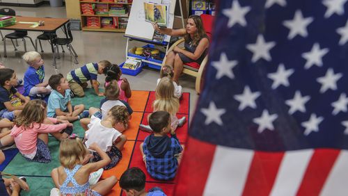 Kristin Shidneck reads out loud to her kindergarteners at Mountain View Elementary School  in Cobb County in this July 2017 file photo.