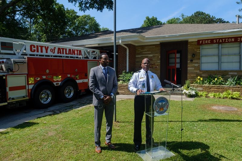 Mayor Andre Dickens (left) and Atlanta Fire Department Chief Roderick Smith (right) speak in front of Atlanta Fire and Rescue Station 26 on Howell Mill Road NW in Atlanta on Monday, May 16, 2022.  (Arvin Temkar / arvin.temkar@ajc.com)