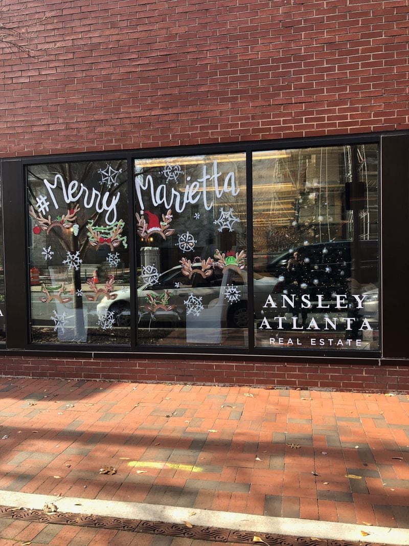 Ansley Atlanta Real Estate won the People's Choice Award in the annual Merry Marietta Window Walk display contest.
