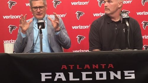 Falcons general manager Thomas Dimitroff and head coach Dan Quinn discussing the draft on Thursday, April 21, 2016. (By D. Orlando Ledbetter/dledbetter@ajc.com)