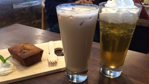 Brown-sugar milk tea and oolong con panna (with cream) are two of the delicious iced tea drinks served at Tea House Formosa on Buford Highway. Shown here with a slice of black-tea banana poundcake. CONTRIBUTED BY WENDELL BROCK