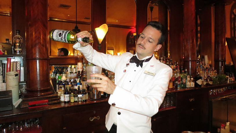 Bartender Christoph Dornemann mixes a Sazerac at the French 75 Bar in New Orleans. Contributed by Wesley K.H. Teo