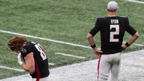 122020 Atlanta: Atlanta Falcons quarterback Matt Ryan and tight end Hayden Hurst react on the sidelines as the Tampa Bay Buccaneers gain a first down to run out the clock in a 31-27 victory over the Falcons Sunday, Dec. 20, 2020, in Atlanta. (Curtis Compton / Curtis.Compton@ajc.com)