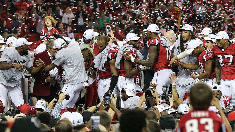 The Falcons dance on stage Sunday, Jan. 22, 2017, celebrating beating the Packers 44-21 in the NFC Championship game in Atlanta to advance to the Super Bowl.