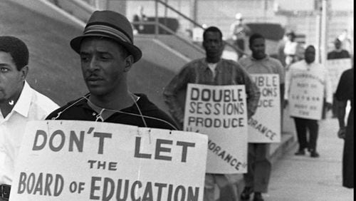 In 1967, African-American parents fought against segregated schools, picketing outside the Atlanta Public Schools offices. CHARLES R. PUGH, JR. / THE ATLANTA JOURNAL-CONSTITUTION