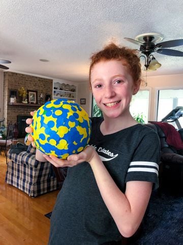 Photos: How to build the world's biggest (maybe) sticker ball