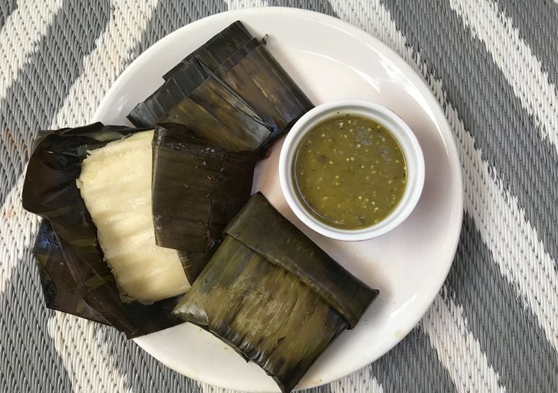 El Ponce sells single-serving and family-size portions of Oaxacan-style tamales. Filled with pork, chicken or mushroom-poblano, the tamales are tightly wrapped in banana leaves, frozen, and packed in a zip-close bag. LIGAYA FIGUERAS / LIGAYA.FIGUERAS@AJC.COM