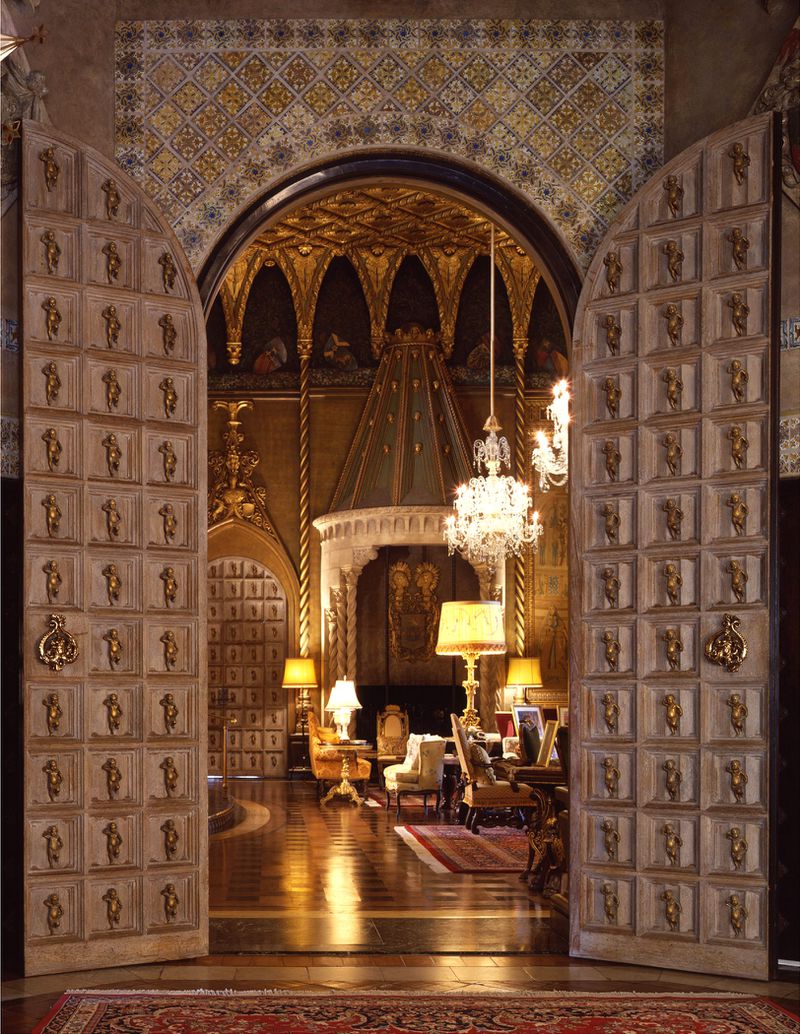 Visitors to Mar-a-Lago, then and now, enter the living room through massive carved doors, seen in this 1993 photograph. Photo / C.J. Walker