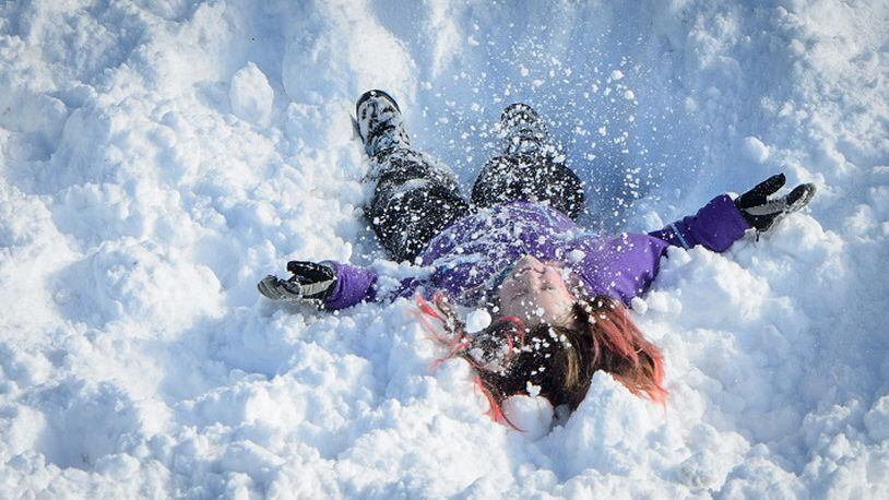 Kids (and some adults) love eating snow. But should you? (Glen Stubbe/Minneapolis Star Tribune/TNS)
