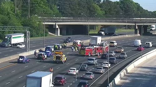 A fatal wreck involving a motorcycle shut down several lanes of I-75 South  in Marietta for more than two hours Tuesday.