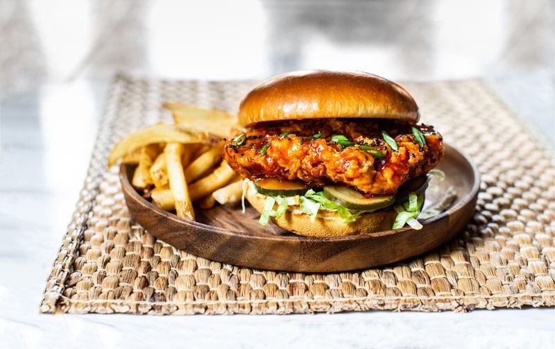 Order a Korean chicken sandwich at Black Walnut Cafe, with locations in Alpharetta and Peachtree Corners.