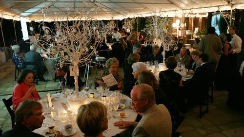 Guests enjoy dinner and an auction during a previous Vintage Affair gala at the former Glenridge Hall.