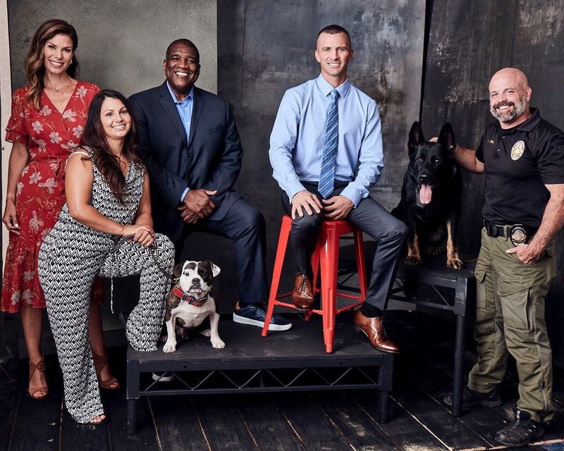 Sgt. Mark Tappan (far right) and Mattis (dog second from right) pose with the hosts of new yet-aired A&E show "America's Top Dog." (@tvguidemagazine and @iheartmaarten courtesy of Alpharetta police)