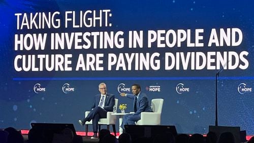 Delta CEO Ed Bastian speaks on stage with Operation HOPE CEO John Hope Bryant at the 2023 HOPE Global Forum.