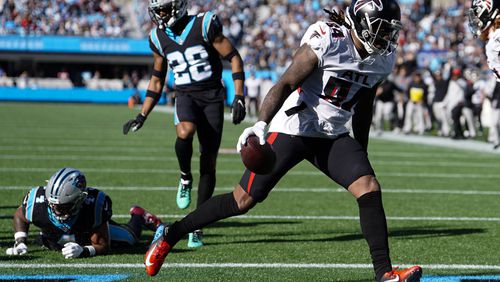 Falcons running back Cordarrelle Patterson, who only played 34 of the 69 offensive snaps (49%), scores during the first quarter of Sunday's game against the Panthers in Charlotte. (AP Photo/Jacob Kupferman)