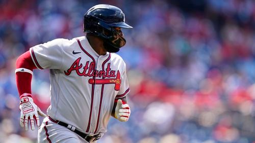 Atlanta Braves' Abraham Almonte runs to first base Thursday, June 10, 2021, against the Phillies in Philadelphia. (Matt Slocum/AP)