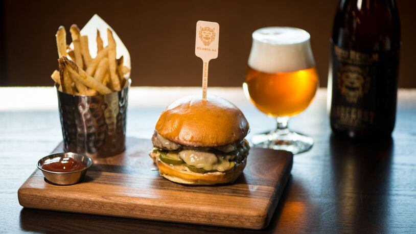 New Realm Brewing The Radegast Burger with White Cheddar, House made Sour Pickles, Special Sauce, Brioche Bun, pictured with Radegast Triple IPA.. Photo credit- Mia Yakel.