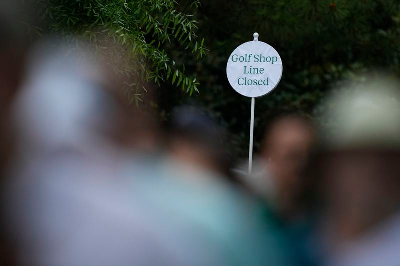 A sign is posted closing the golf shop line during a practice round at the Masters golf tournament at Augusta National Golf Club, Tuesday, April 9, 2024, in Augusta, Ga. Richard Globensky has been charged in federal court in Illinois in the transport of millions of dollars worth of Masters golf tournament merchandise and memorabilia stolen from Augusta National Golf Club in Georgia, according to court documents filed Tuesday, April 16, 2024. The items were taken from the famous golf club and other locations beginning in 2009 through 2022, according to the government. (AP Photo/Matt Slocum, File)