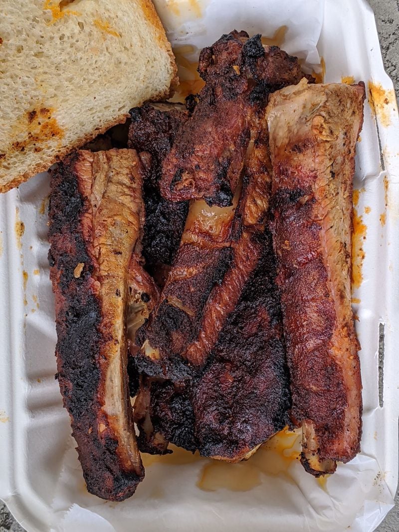 Lake & Oak BBQ is putting out some satisfyingly smoky barbecue, including this half slab of ribs. CONTRIBUTED BY PAULA PONTES
