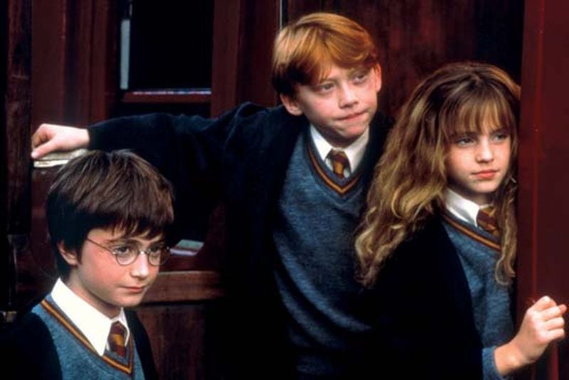 They don’t look a day over 11! Harry (Daniel Radcliffe), Ron (Rupert Grint) and Hermione (Emma Watson) in 2001’s “Harry Potter and the Sorcerer’s Stone,” the first film in the franchise. (Contributed by Warner Bros. Pictures)