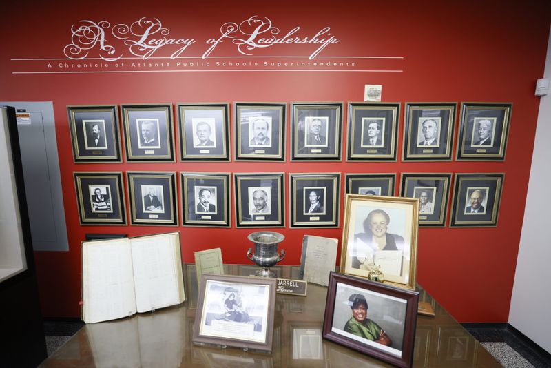 The "superintendents corner" at the APS archive museum displays a collection of photographs featuring the previous leaders of the institution, plus the current superintendent, Lisa Herring. (Miguel Martinez /miguel.martinezjimenez@ajc.com)