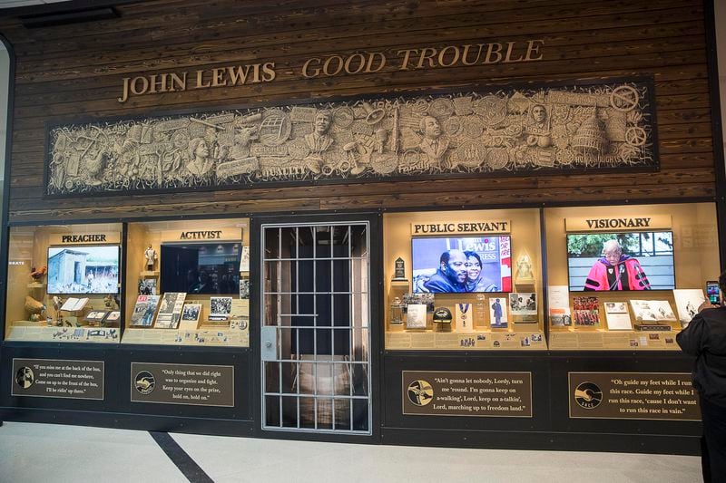 The "John Lewis-Good Trouble" tribute wall is in the Hartsfield-Jackson International Airport’s domestic terminal atrium area. It includes historical artifacts, audio and visual installations and tributes to  Lewis. (ALYSSA POINTER/ALYSSA.POINTER@AJC.COM)