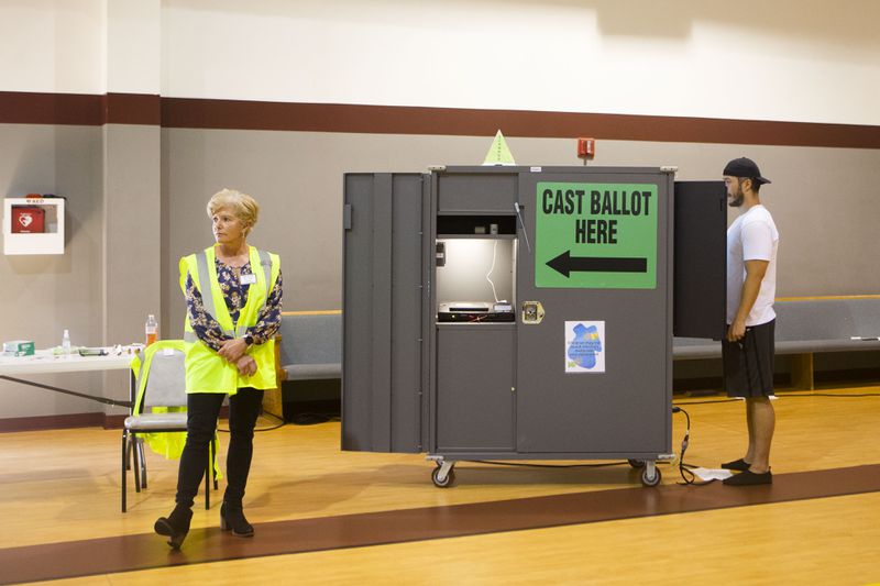 Facing pressure to update Georgia’s voting system software before next year, Secretary of State Brad Raffensperger is pursuing a different angle. He is calling on lawmakers to make tampering with Georgia’s election system a felony carrying a minimum sentence of 10 years. (Christina Matacotta for The Atlanta Journal-Constitution)