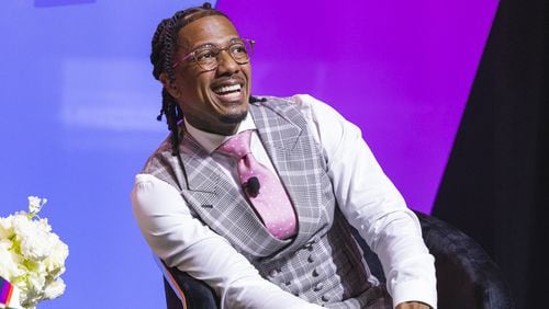 Nick Cannon smiles during an appearance at the Black Enterprise Disruptor Summit in Atlanta on May 18, 2024.