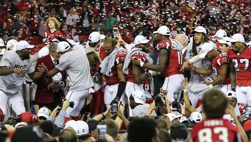 The Falcons dance on stage Sunday, Jan. 22, 2017, celebrating beating the Packers 44-21 in the NFC Championship game in Atlanta to advance to the Super Bowl.