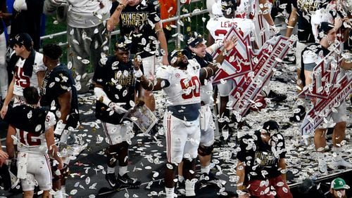 For some teams - say, Alabama, for one - bathing in confetti is the only proper way to end a season. (Mike Zarrilli/Getty Images)