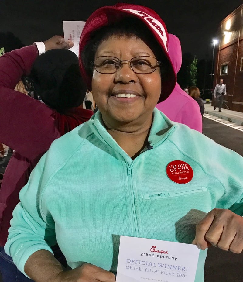 Jean Floyd was the first person in line for the Chick-fil-A First 100 promotion at the newest restaurant at 3724 Cascade Road in southwest Atlanta. LIGAYA FIGUERAS / LIGAYA.FIGUERAS@AJC.COM