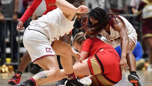 March 12, 2021 Macon - Greater Atlanta Christian's Molly Pritchard (0) grabs a loose ball during the 2021 GHSA State Basketball Class AAA Girls Championship game at the Macon Centreplex in Macon on Friday, March 12, 2021 Cross Creek won 56-44 over Greater Atlanta Christian. (Hyosub Shin / Hyosub.Shin@ajc.com)