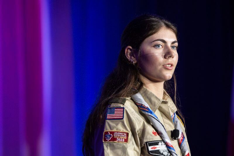 Selby Chipman, 20-year-old, speaks at the Boys Scouts of America annual meeting in Orlando, Fla., Tuesday, May 7, 2024. Chipman, a student at the University of Missouri, is an Inaugural Female Eagle Scout and the Assistant Scoutmaster for an all girls troop 8219 in Oak Ridge, N.C. The Boy Scouts of America is changing its name for the first time in its 114-year history and will become Scouting America. (AP Photo/Kevin Kolczynski)