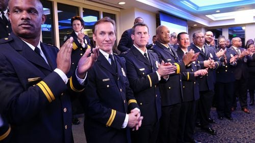 Atlanta Police Chief Erika Shields (second from left) introduces her command staff after taking her oath of office Jan. 10. Curtis Compton/ccompton@ajc.com
