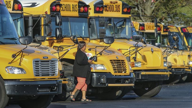 Several buses remained in the parking lot during morning pickup times at the DeKalb County School District’s Offices at 1701 Mountain Industrial Boulevard in Stone Mountain on Thursday morning April 19, 2018.