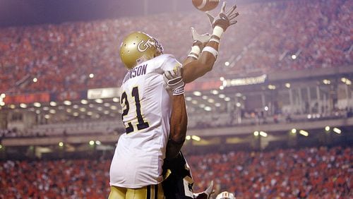AUBURN, AL - SEPTEMBER 3: Wide receiver Calvin Johnson #21 of the Georgia Tech Yellow Jackets fails to catch a pass in the end zone against defensive back Patrick Lee #20 of the Auburn Tigers in the fourth quarter on September 3, 2005 at Jordan-Hare Stadium in Auburn, Alabama. Georgia Tech defeated Auburn 23-14. (Photo by Brian Bahr/Getty Images)
