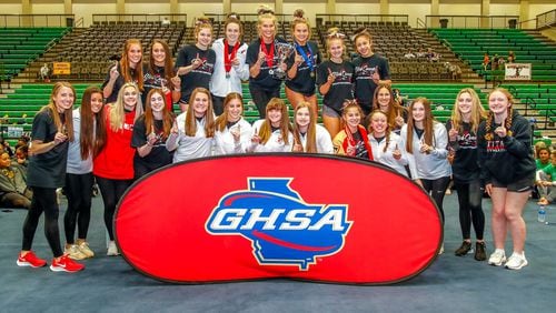 The North Oconee gym team won the 1A-5A state championship on April 24 at Buford Arena. Front row, from left: Coach Hillary Sanders, Sofia Lee, SK Langley, Delaney Boswell, Grace Anne Cain, Mary Hotcaveg, Emma Haygood, Caroline McDonald, Frannie Katz, Ila Schwender, Sarah Waters, Caleigh Connors, Maggie Nunn; Back row, from left: Kacey Turk, Lila Smith, Chloe McDonald, Maylen Pulliam, Madison McMullen, Brantley Lucas, Kate Stetter, Gabby Nguyen, Coach Ashley Owens.