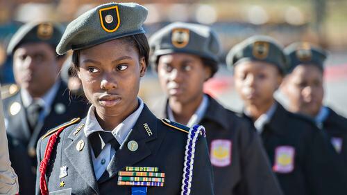 In this file photo, Ajai Bogle with the Miller Grove High Army JROTC stands with her unit during the 74th anniversary of Pearl Harbor ceremony at the DeKalb County School District Administrative and Instructional Complex in Stone Mountain on December 7, 2015.