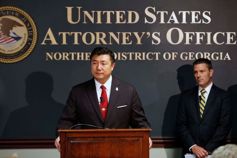 U.S. Attorney Byung J. “BJay” Pak, at the podium next to Chris Hacker, Special Agent in Charge of the FBI in Atlanta, announcing that Georgia Insurance Commissioner Jim Beck has been indicted by a federal grand jury on charges of wire fraud, mail fraud and money laundering. Bob Andres / bandres@ajc.com