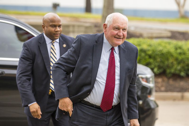 04/05/2019 -- Newnan, Georgia -- United States Secretary of Agriculture Sonny Perdue (center) arrives at the U.S. Department of Agriculture's National Detector Dog Training Facility in Newnan, Friday, April 5, 2019.  (ALYSSA POINTER/ALYSSA.POINTER@AJC.COM)